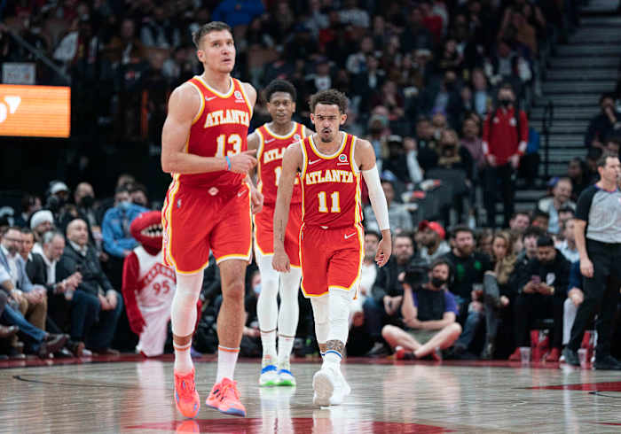 Apr 5, 2022; Toronto, Ontario, CAN; Atlanta Hawks guard Trae Young (11) reacts during the fourth quarter against Toronto Raptors at Scotiabank Arena.